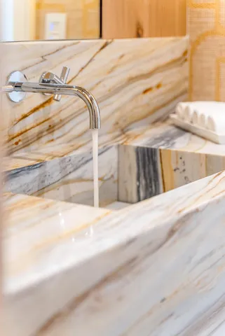 a view of a balcony with wooden floor