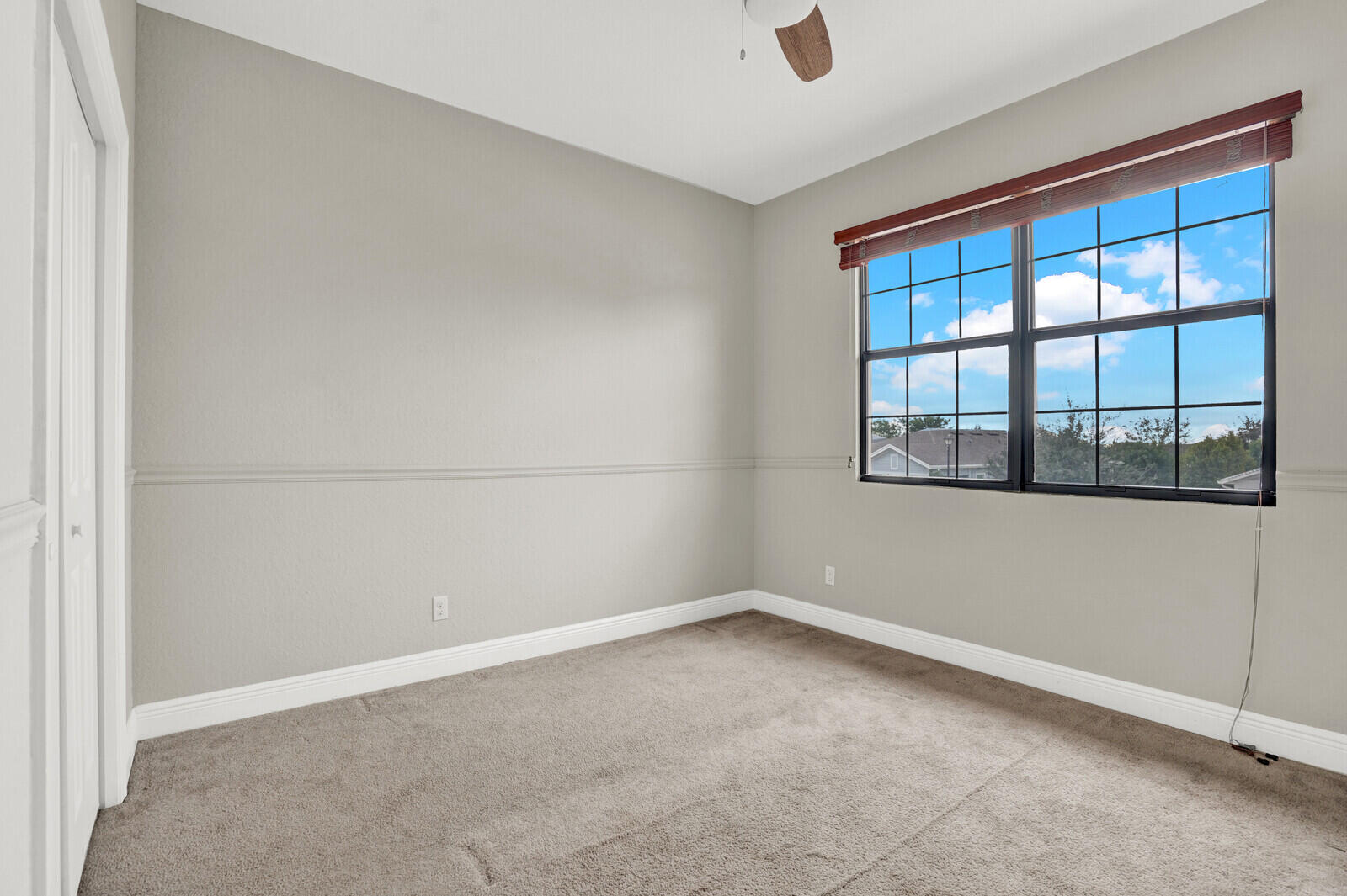 19739 Wheelbarrow Bend Loxahatchee, FL 33470 - Photo 34 of 57 an empty room with a window