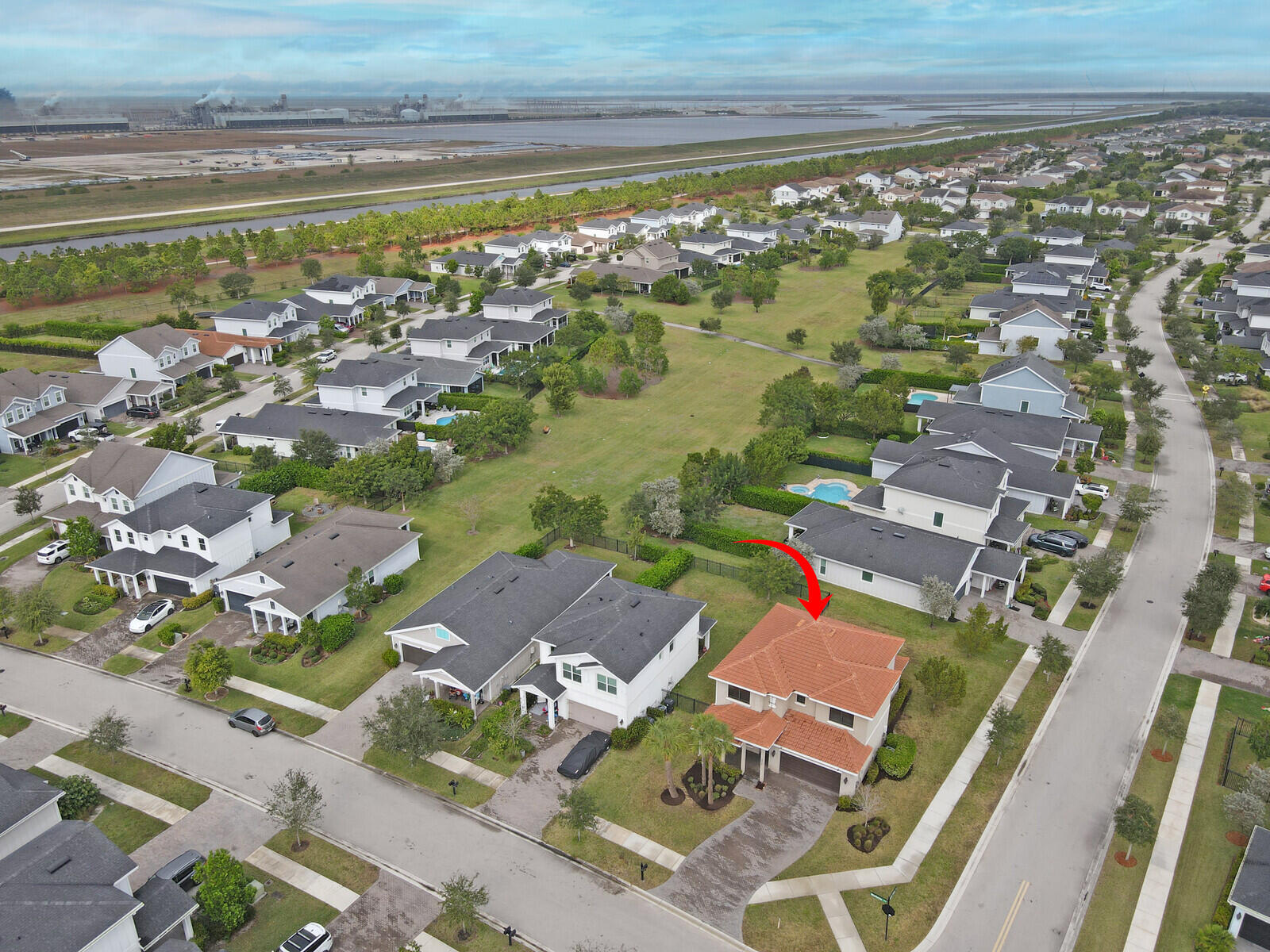19739 Wheelbarrow Bend Loxahatchee, FL 33470 - Photo 4 of 57 an aerial view of residential houses with outdoor space