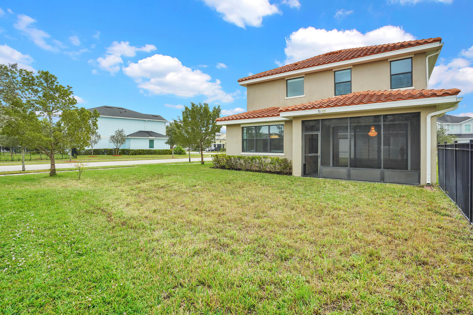 19739 Wheelbarrow Bend Loxahatchee, FL 33470 - Photo 47 of 57 a view of a house with yard and tree s