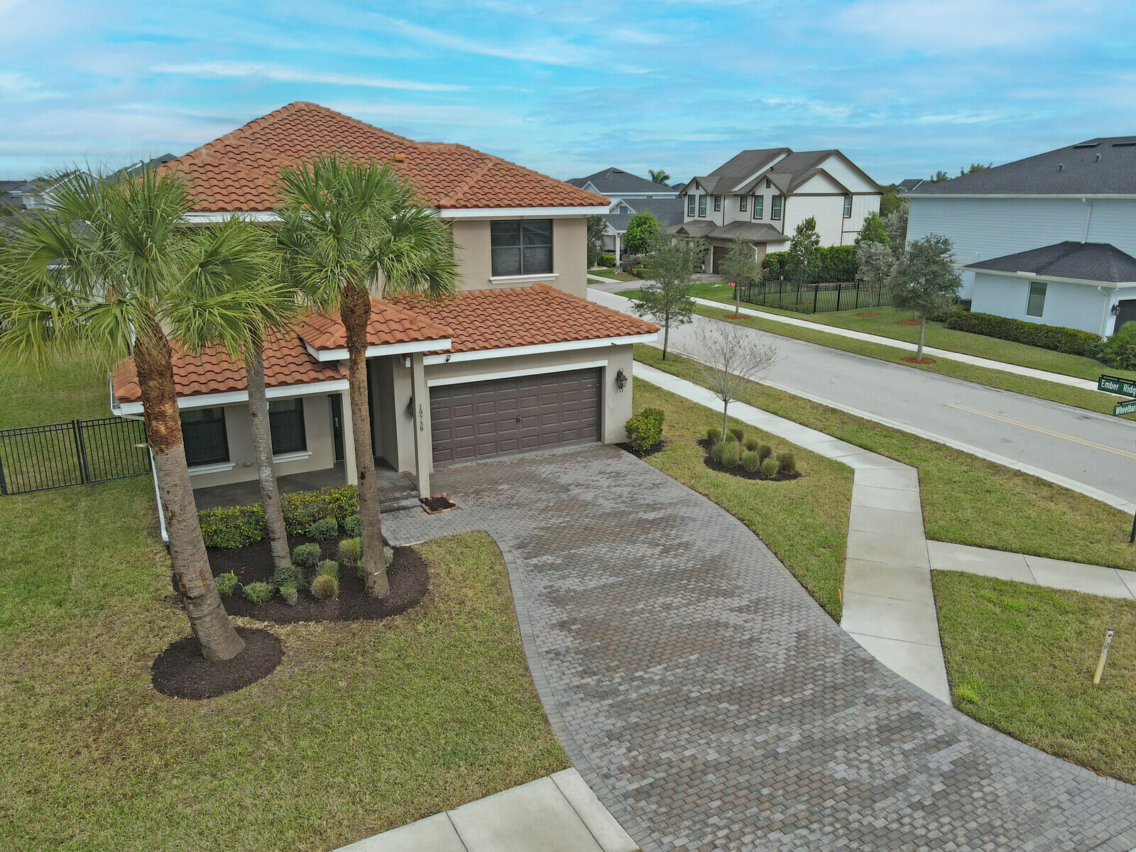 19739 Wheelbarrow Bend Loxahatchee, FL 33470 - Photo 48 of 57 a view of a house with a yard