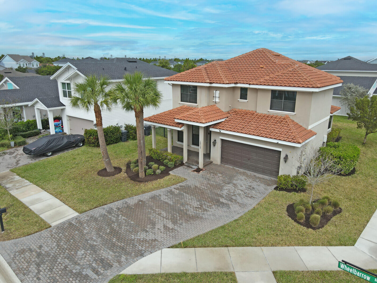 19739 Wheelbarrow Bend Loxahatchee, FL 33470 - Photo 49 of 57 front view of a house with yard