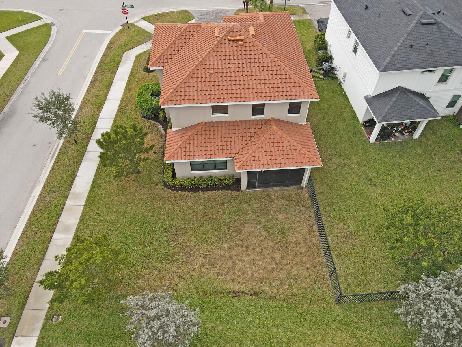 19739 Wheelbarrow Bend Loxahatchee, FL 33470 - Photo 51 of 57 a aerial view of a house with a yard