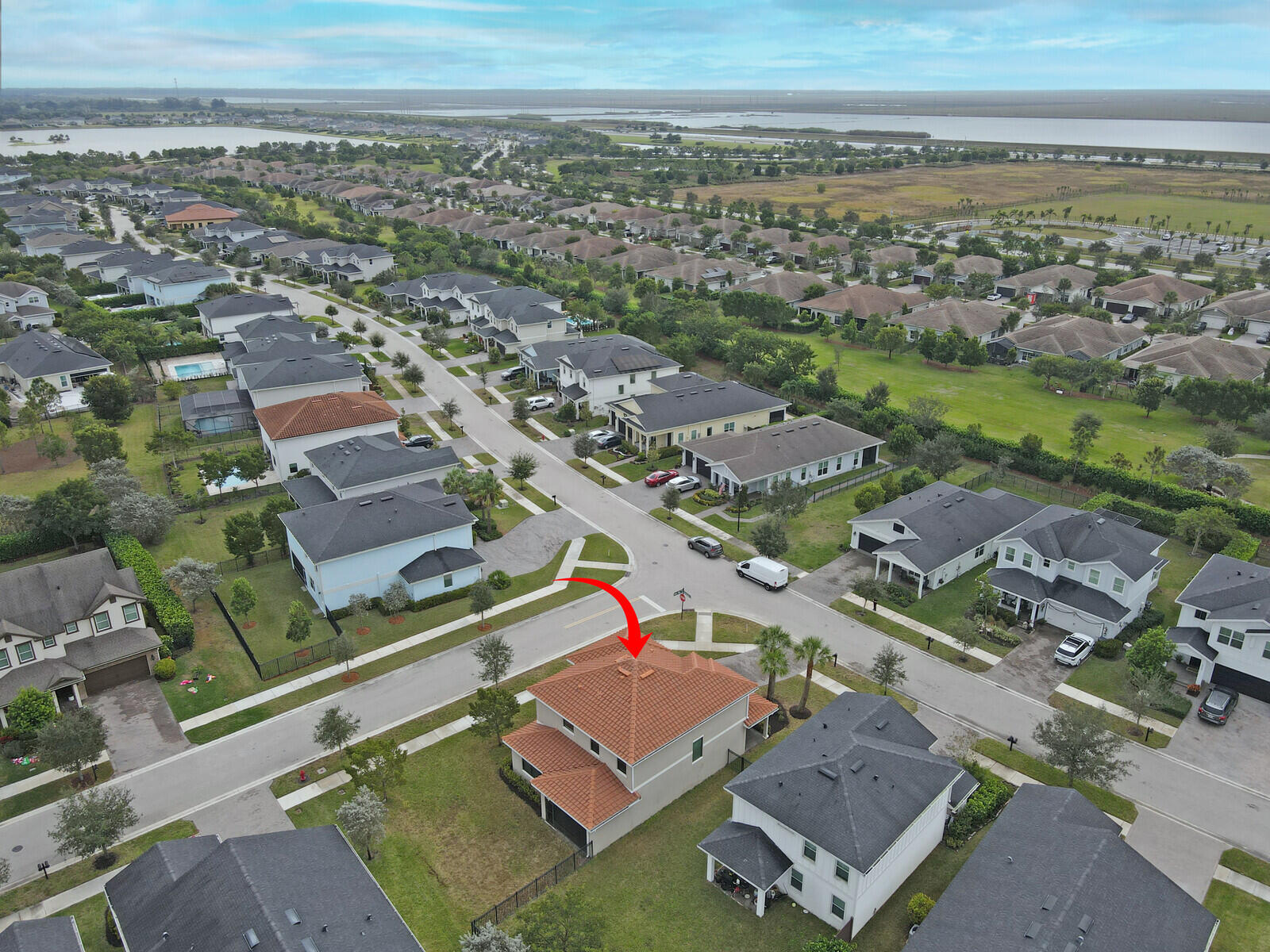 19739 Wheelbarrow Bend Loxahatchee, FL 33470 - Photo 53 of 57 an aerial view of residential houses with outdoor space