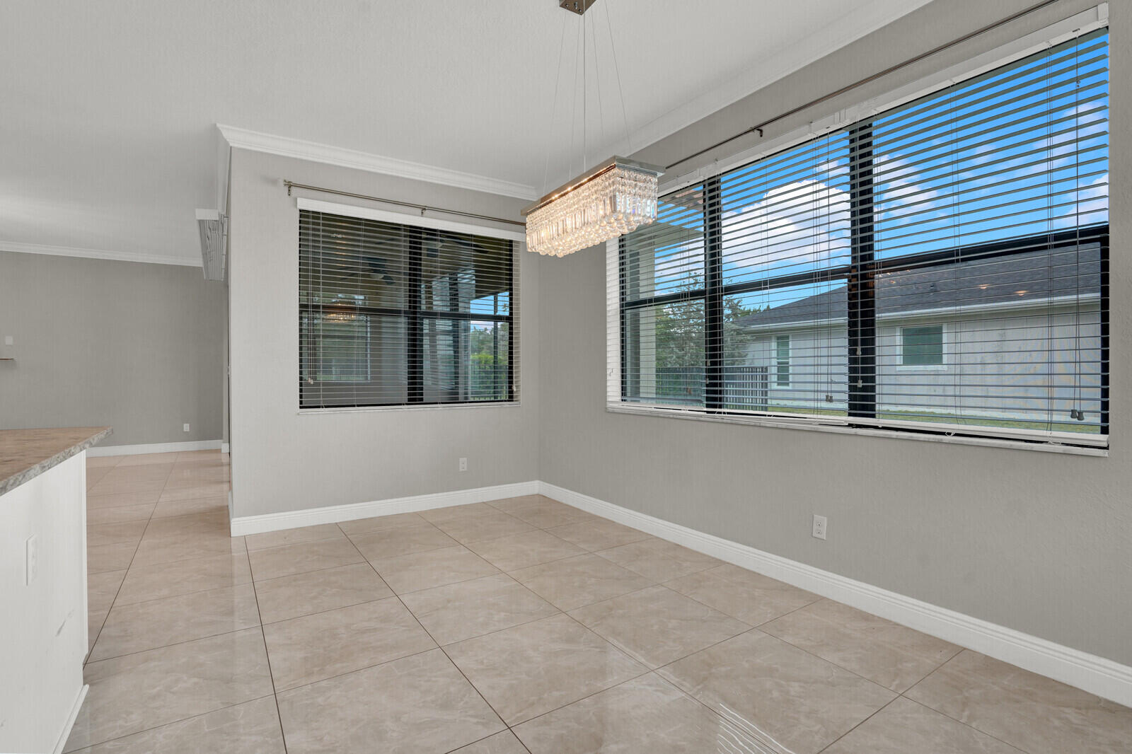 19739 Wheelbarrow Bend Loxahatchee, FL 33470 - Photo 10 of 57 a view of an empty room with a window