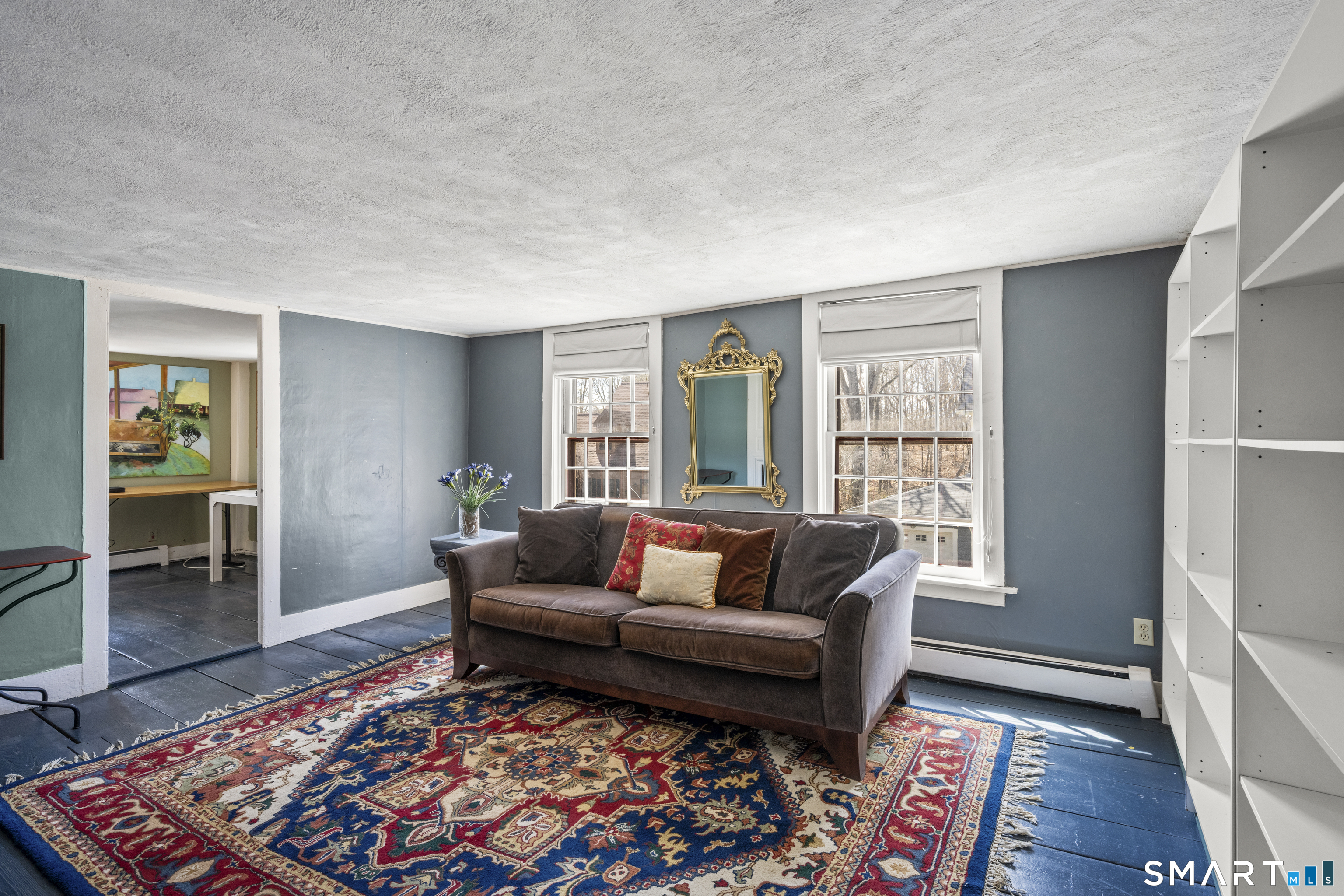371 Washington Street Norwich, CT 06360 - Photo 21 of 38 a living room with furniture and a rug