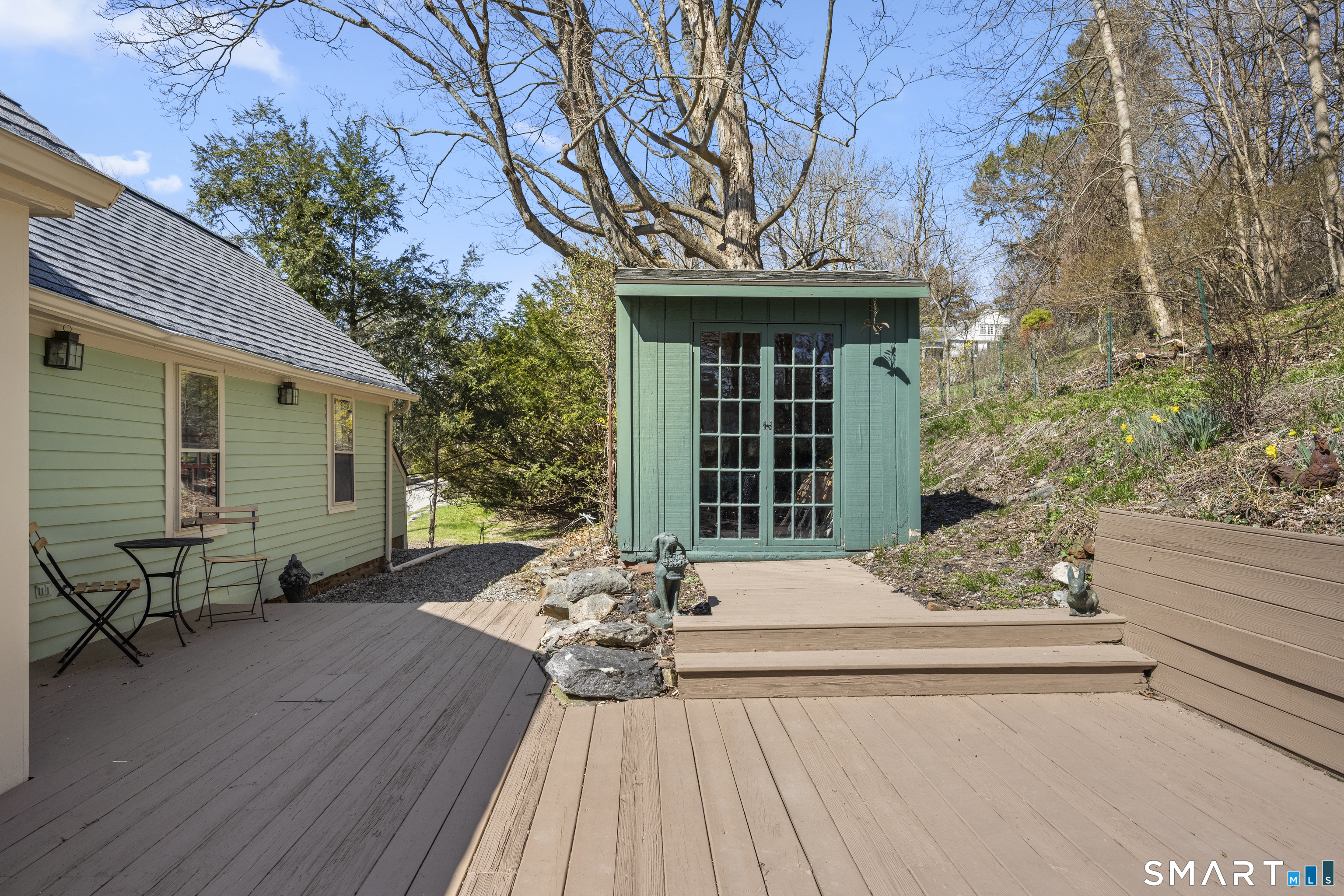 371 Washington Street Norwich, CT 06360 - Photo 28 of 38 a front view of a house with outdoor seating