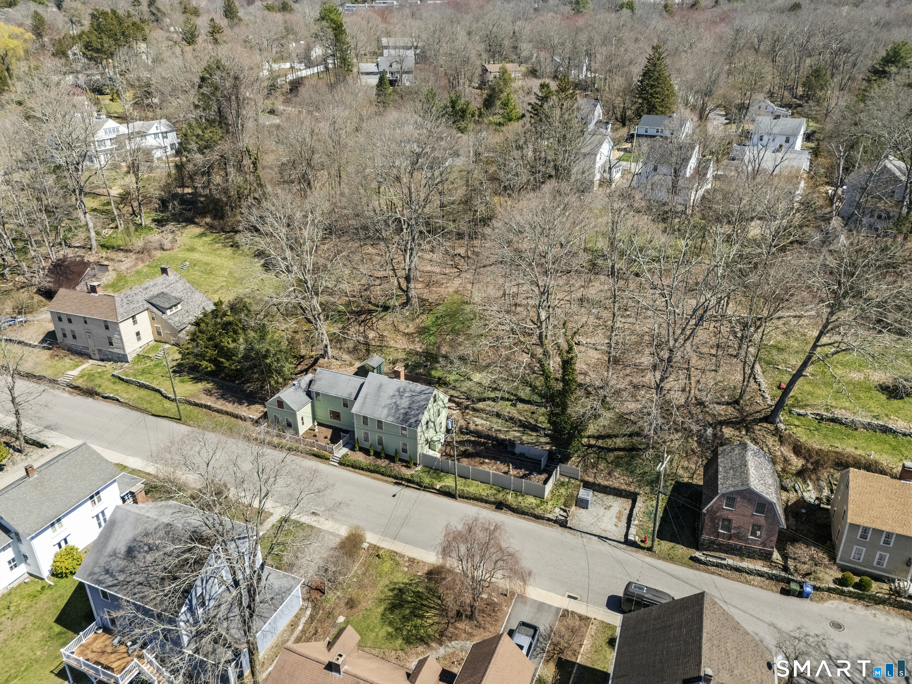 371 Washington Street Norwich, CT 06360 - Photo 38 of 38 an aerial view of a house with a yard