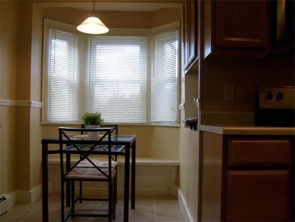 126 Temby Street Springfield, MA 01119 - Photo 4 of 14 a view of a room with a table and chairs