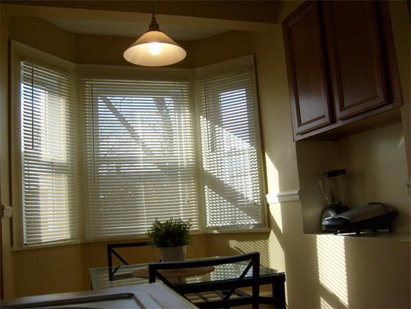 126 Temby Street Springfield, MA 01119 - Photo 7 of 14 a view of a room with a window and wooden floor