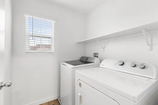 a utility room with dryer and washer