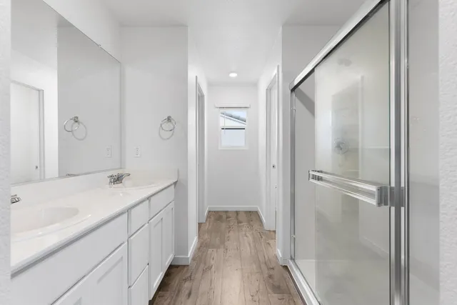 a bathroom with a bathtub and a sink
