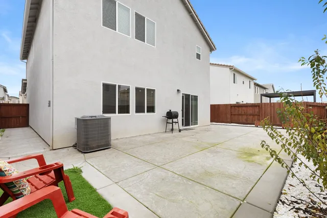 a view of a terrace with chairs