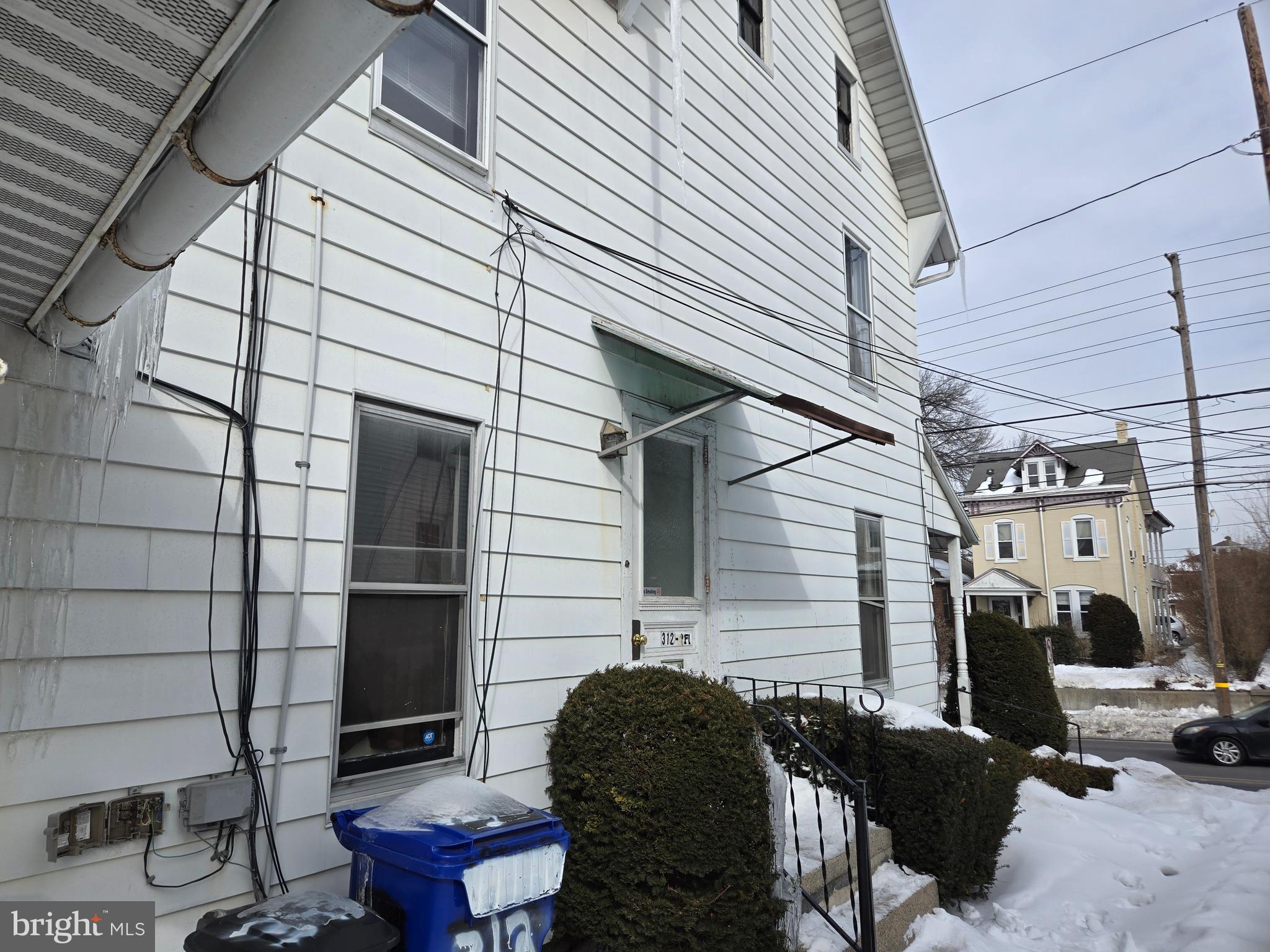 312 West Lancaster Avenue Shillington, PA 19607 - Photo 2 of 15 Left Side of Home Showing Door To Second Floor