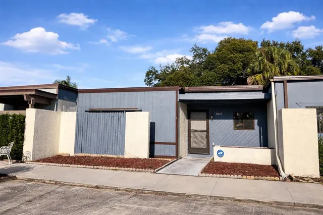 a view of a house with a garage