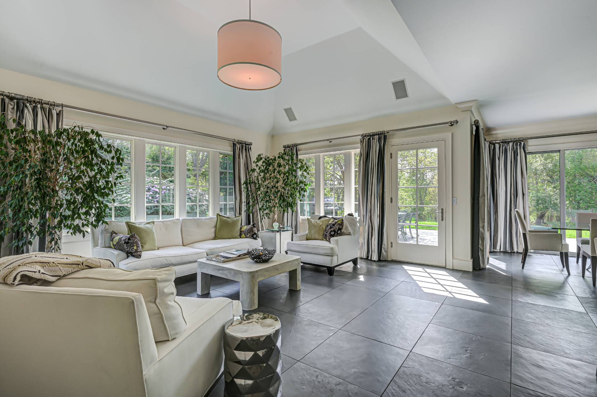 Undisclosed Address Remsenburg, NY 11960 - Photo 15 of 50 a living room with furniture and floor to ceiling windows