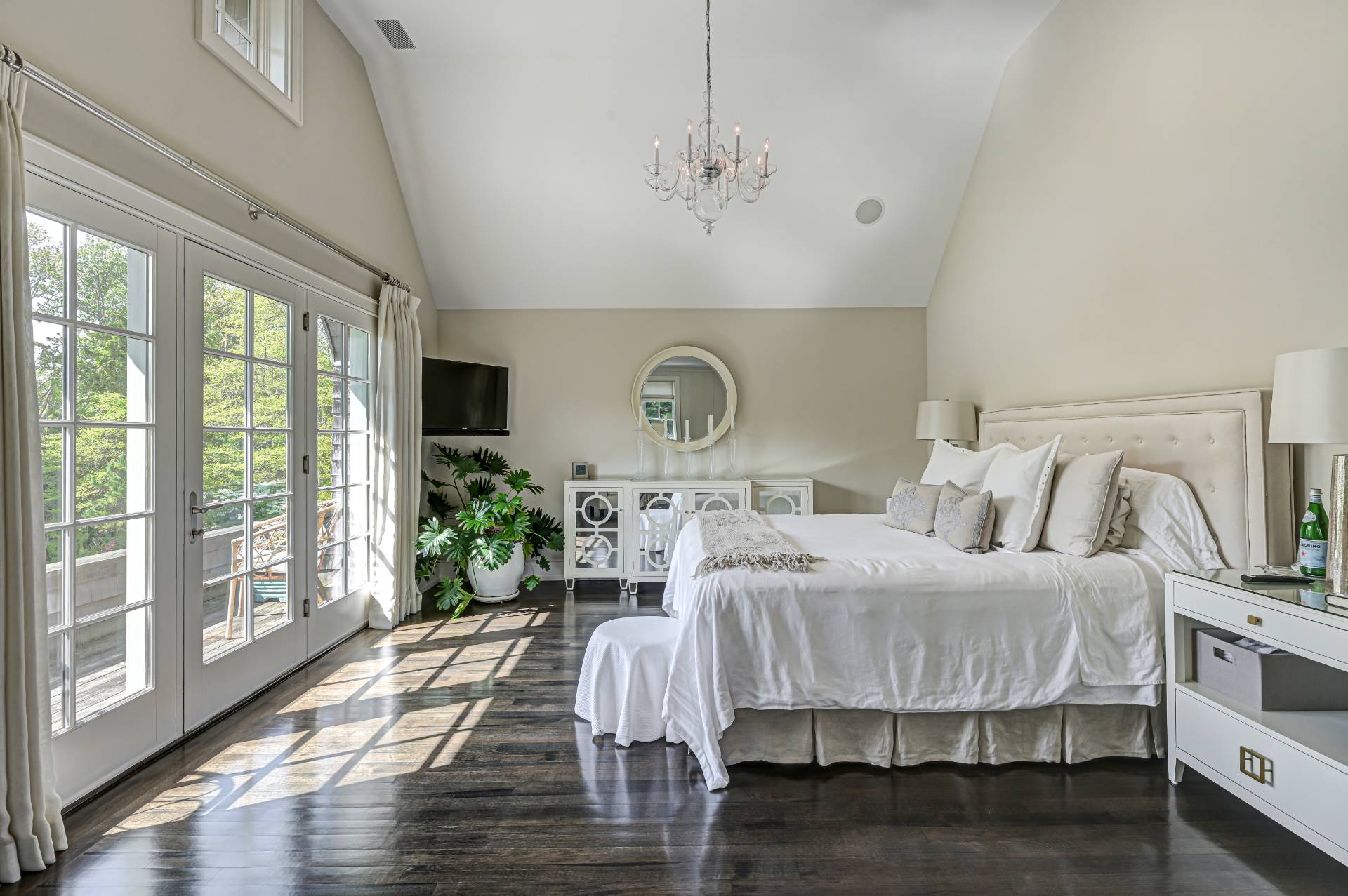 Undisclosed Address Remsenburg, NY 11960 - Photo 23 of 50 a bed room with a bed mirror and a window