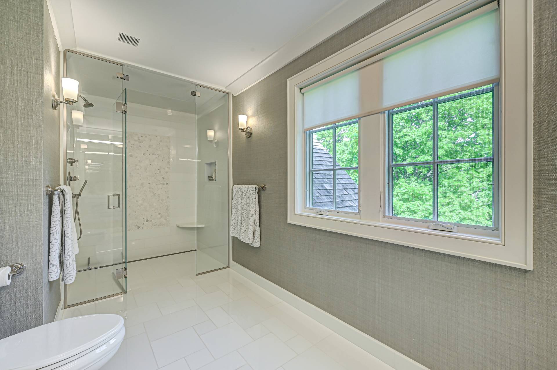 Undisclosed Address Remsenburg, NY 11960 - Photo 26 of 50 a bathroom with a toilet sink shower and windows
