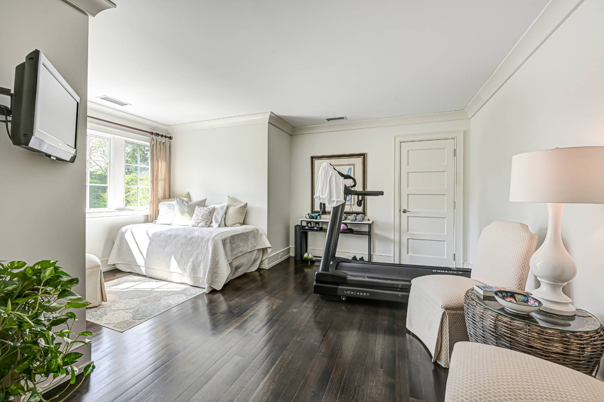 Undisclosed Address Remsenburg, NY 11960 - Photo 27 of 50 a bedroom with bed and flat screen tv