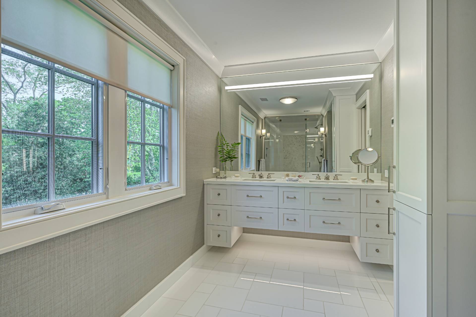 Undisclosed Address Remsenburg, NY 11960 - Photo 28 of 50 a bathroom with a granite countertop sink mirror and a bathtub