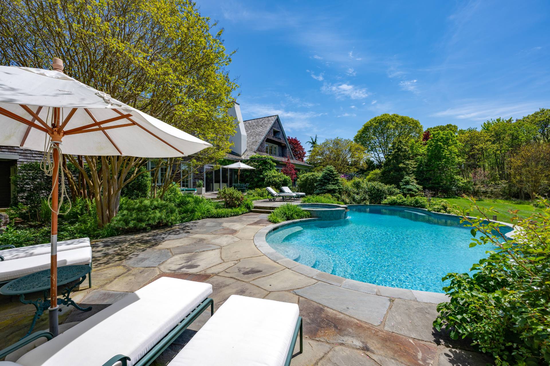 Undisclosed Address Remsenburg, NY 11960 - Photo 38 of 50 a view of a patio with chairs and plants