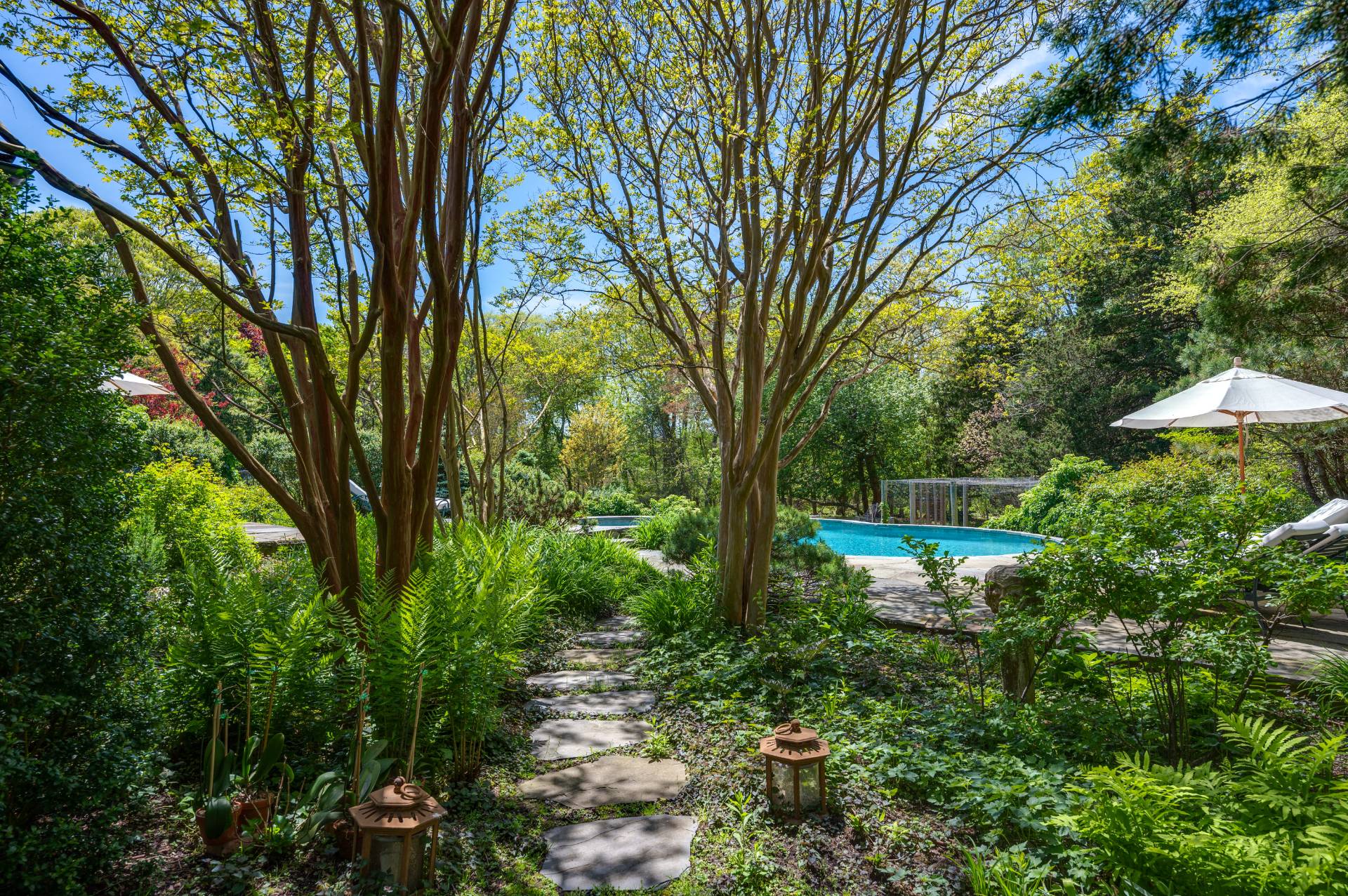 Undisclosed Address Remsenburg, NY 11960 - Photo 39 of 50 a view of backyard with plants and outdoor seating