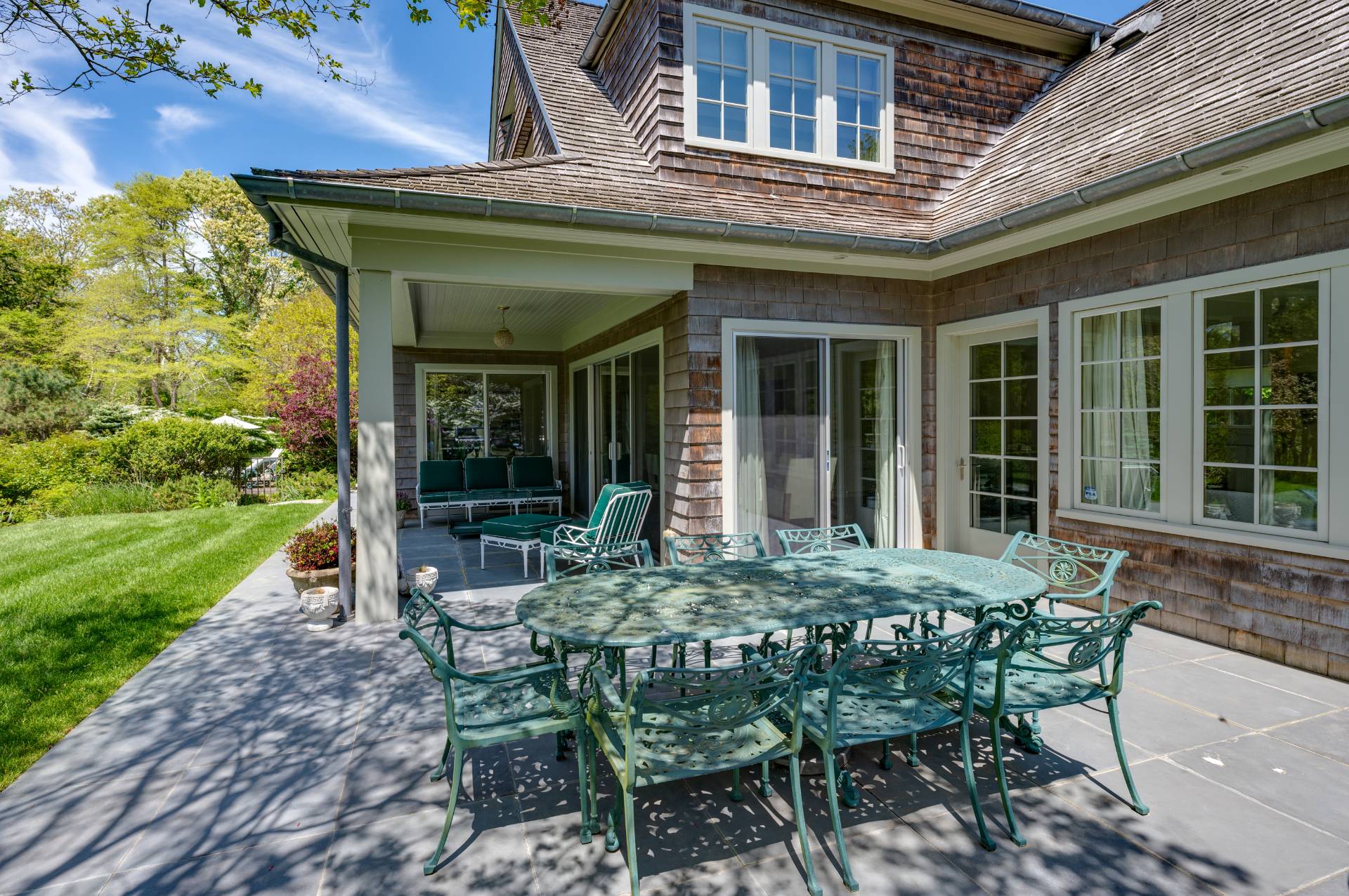 Undisclosed Address Remsenburg, NY 11960 - Photo 42 of 50 a house view with a sitting space and garden space