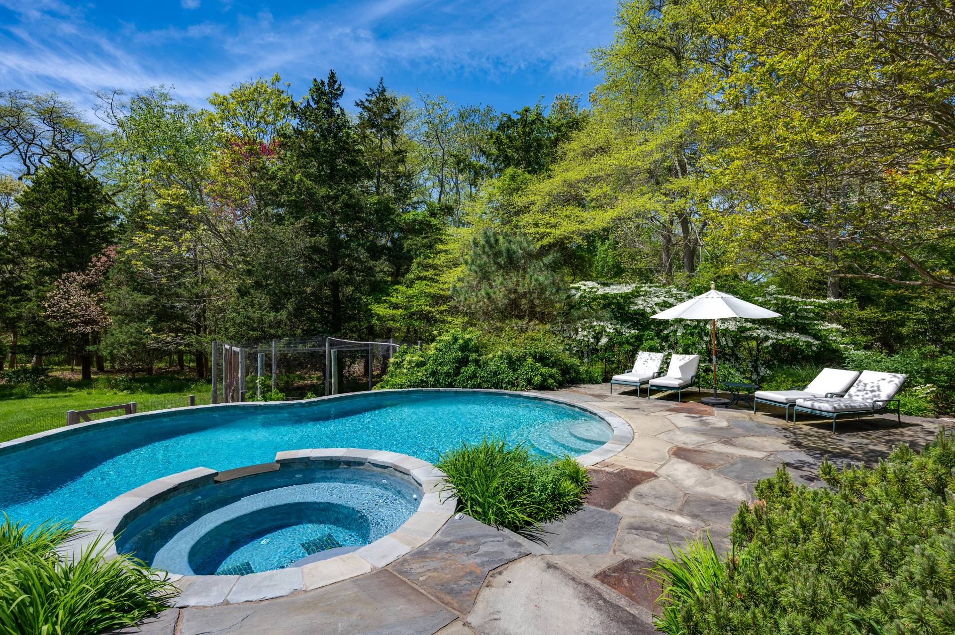 Undisclosed Address Remsenburg, NY 11960 - Photo 45 of 50 a view of a backyard with swimming pool