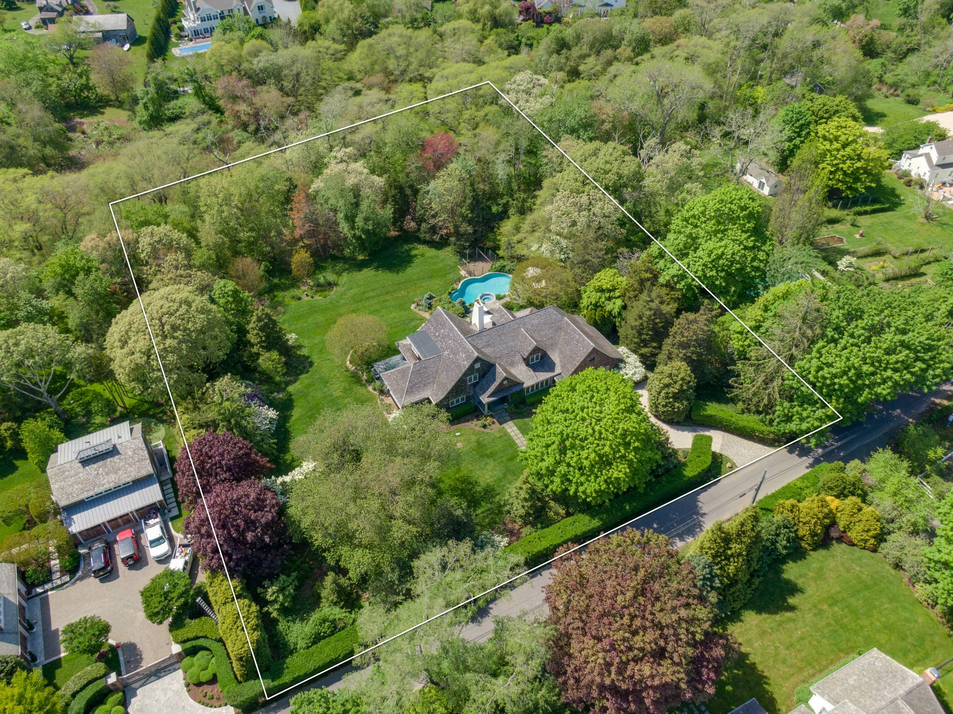 Undisclosed Address Remsenburg, NY 11960 - Photo 50 of 50 an aerial view of a house with a yard