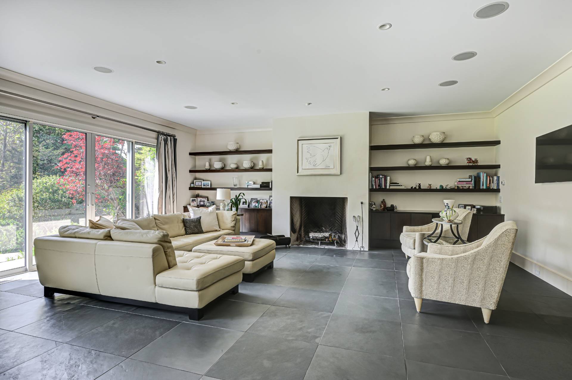 Undisclosed Address Remsenburg, NY 11960 - Photo 5 of 50 a living room with furniture large window and a fireplace