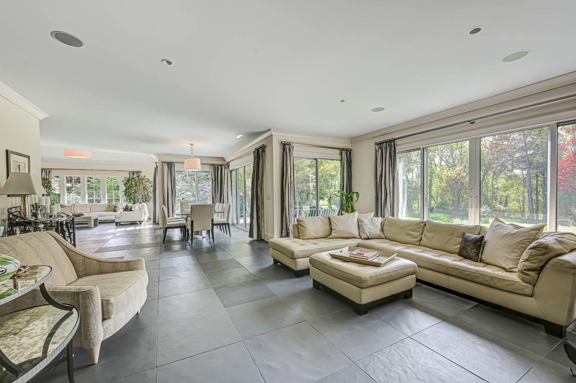Undisclosed Address Remsenburg, NY 11960 - Photo 6 of 50 a living room with furniture and a large window