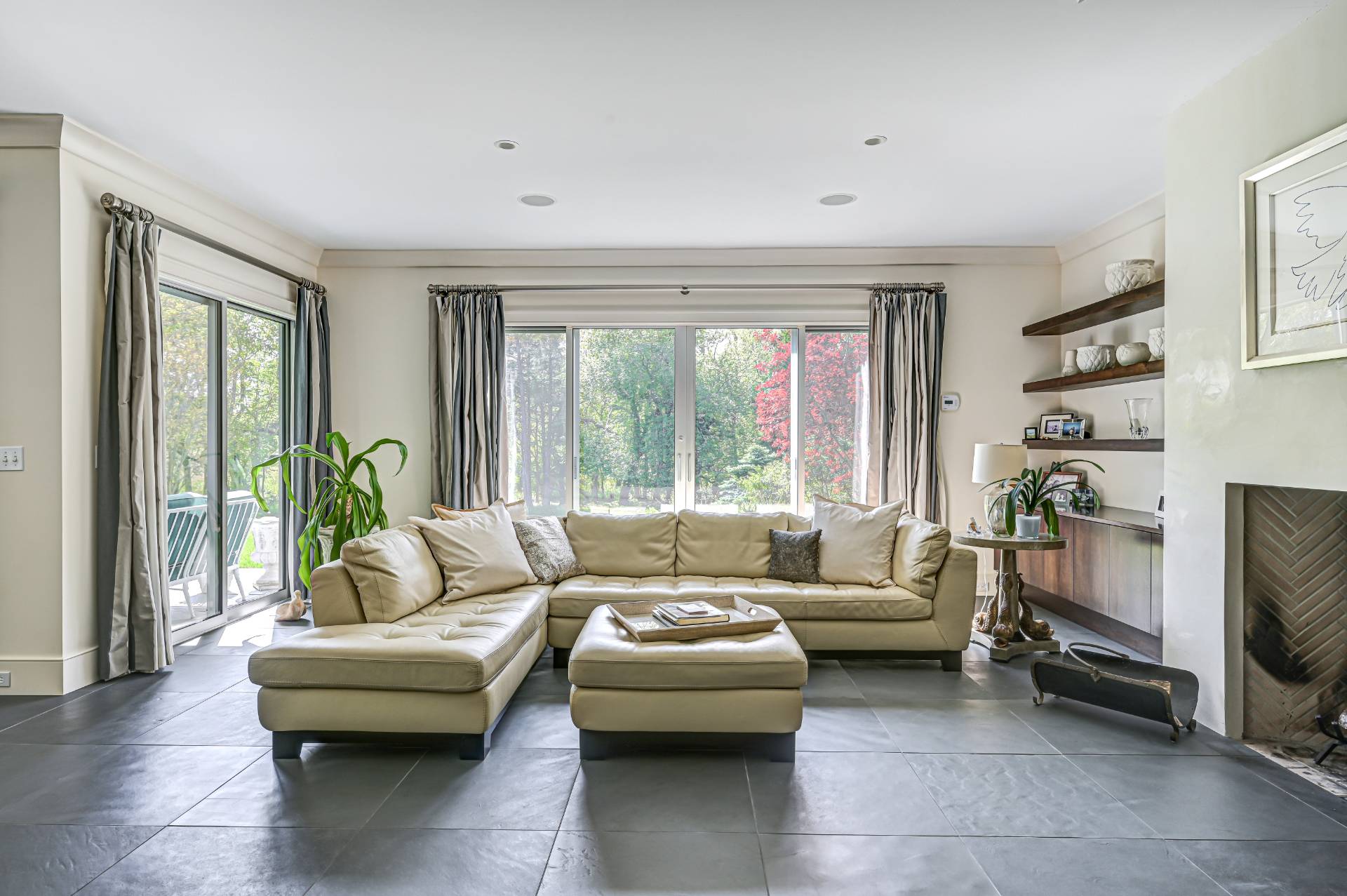 Undisclosed Address Remsenburg, NY 11960 - Photo 7 of 50 a living room with furniture and a large window