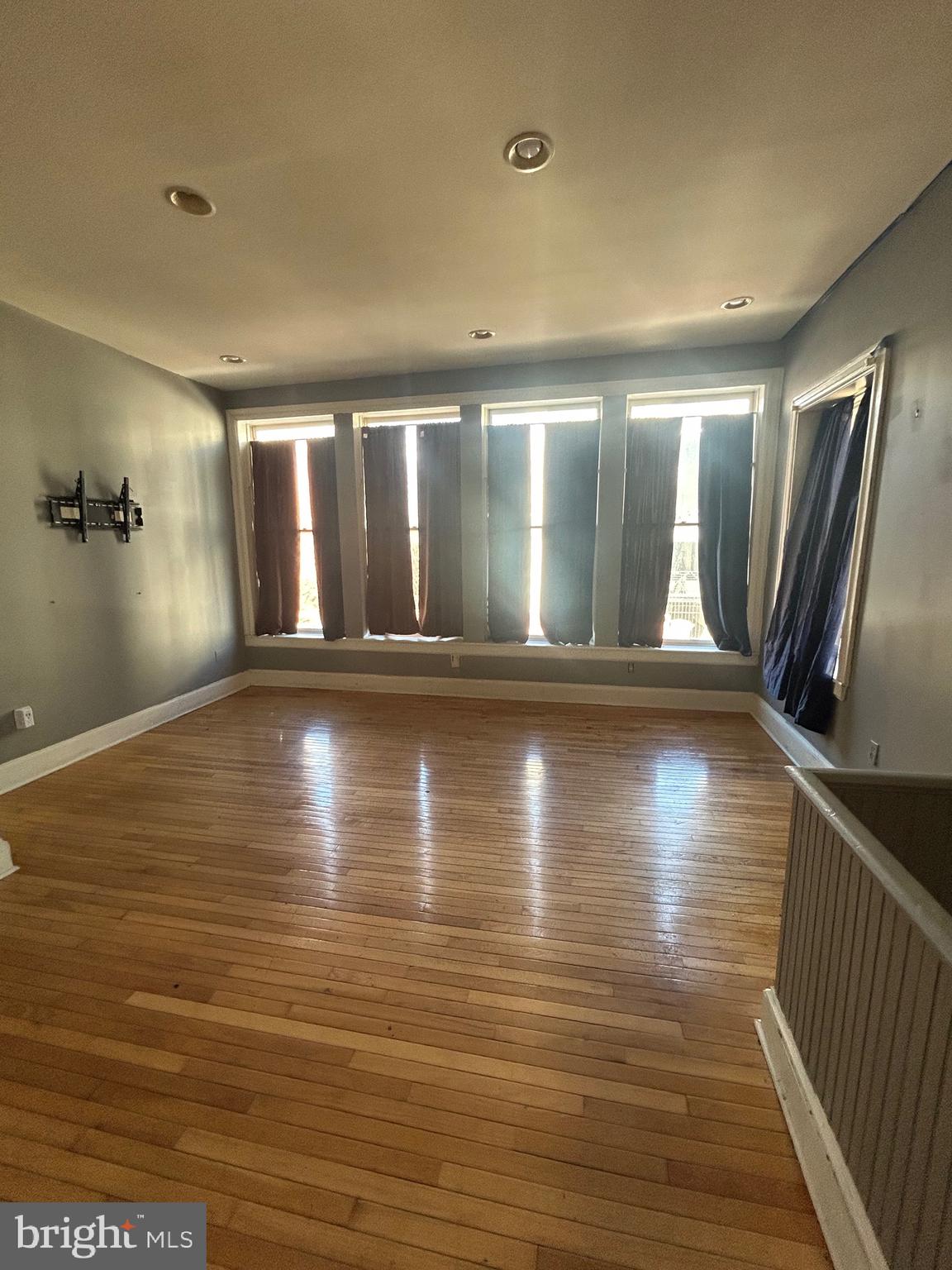 319 West Mulberry Street, Unit 2 Baltimore, MD 21201 - Photo 1 of 7 a view of a room with wooden floor