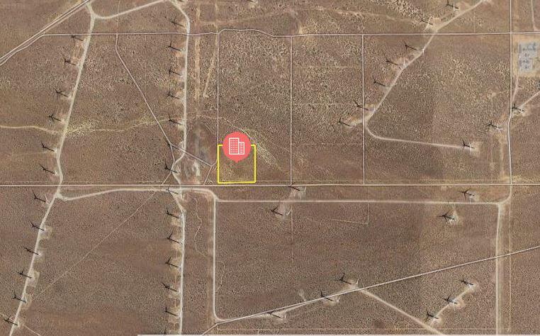 Purdy Avenue Mojave, CA 93501 - Photo 2 of 3 a bathroom with a shower and a shower head