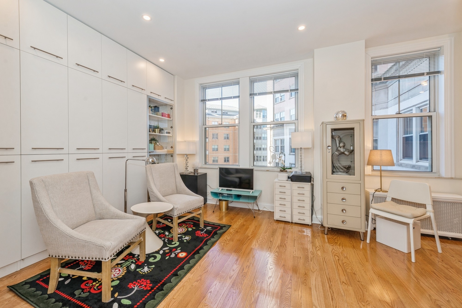 5555 North Sheridan Road, Unit 227 Chicago, IL 60640 - Photo 5 of 23 a living room with furniture and a wooden floor