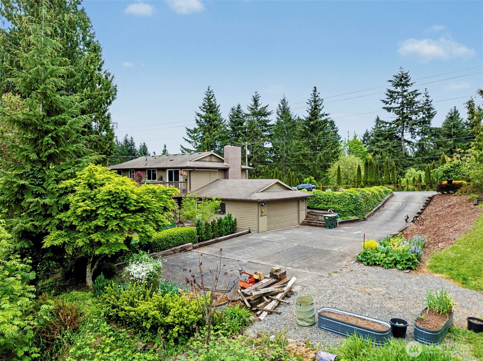 1611 Ham Hill Road Centralia, WA 98531 - Photo 37 of 40 an aerial view of a house with garden space and a patio