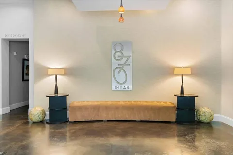 a bedroom with a bed and a table