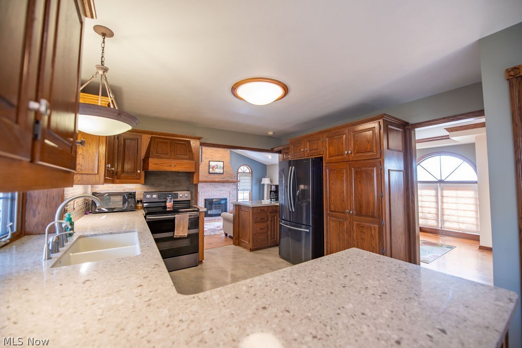 4848 Fette Road Dennison, OH 44621 - Photo 20 of 48 Kitchen view with stainless steel range,refrigerator.