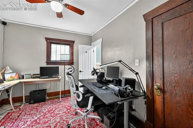 a view of a workspace with furniture