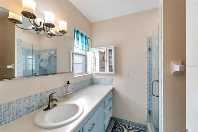 a bathroom with a bathtub and a sink