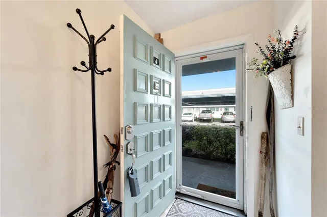 a view of a hallway with elevator