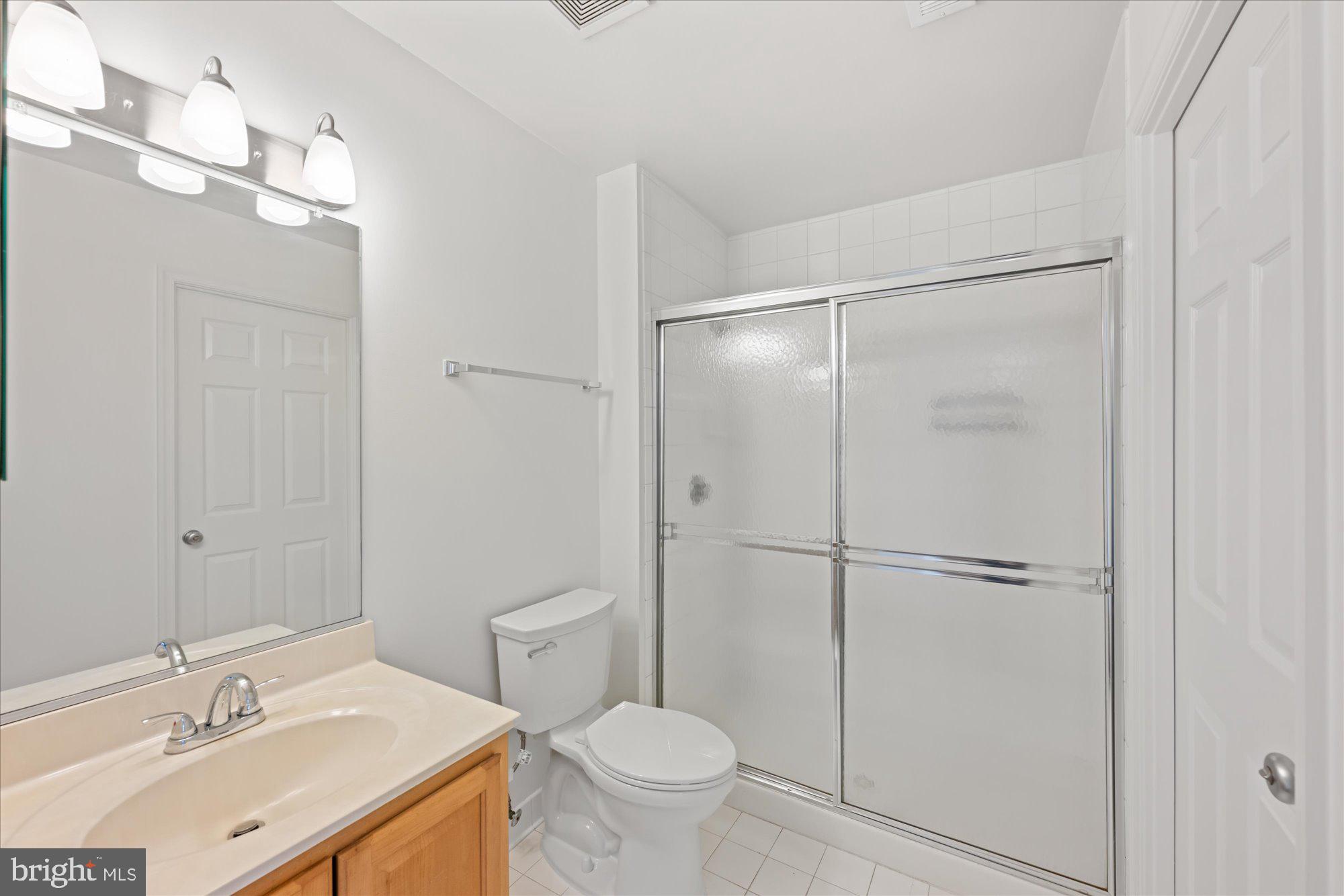 2004 11th Street Northwest, Unit 222 Washington, DC 20001 - Photo 7 of 14 a bathroom with a sink toilet and shower