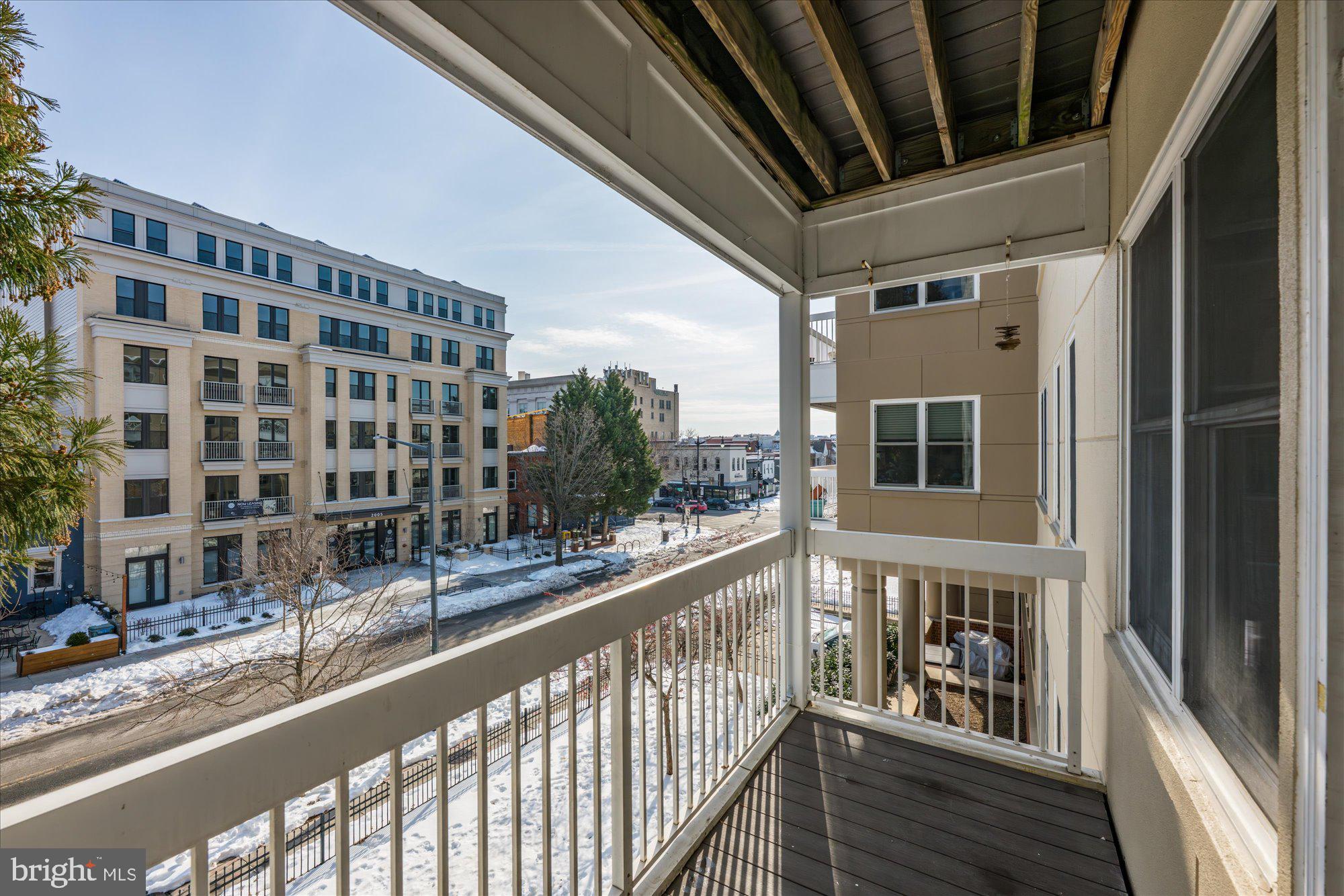 2004 11th Street Northwest, Unit 222 Washington, DC 20001 - Photo 10 of 14 a view of a balcony with a swimming pool