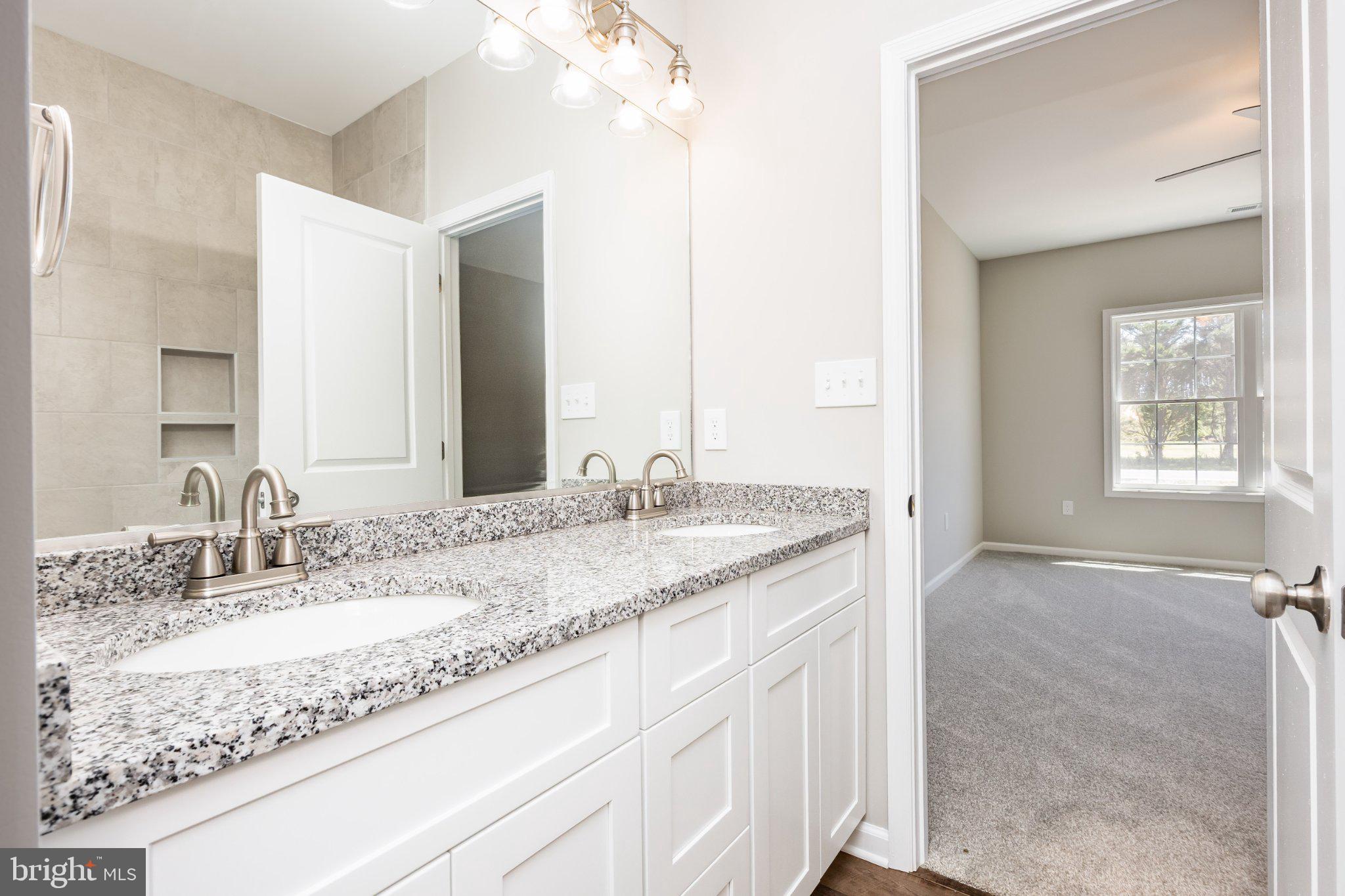14949 Shiloh Church Road Laurel, DE 19956 - Photo 18 of 32 Elegant dual-sink master bath oasis.
