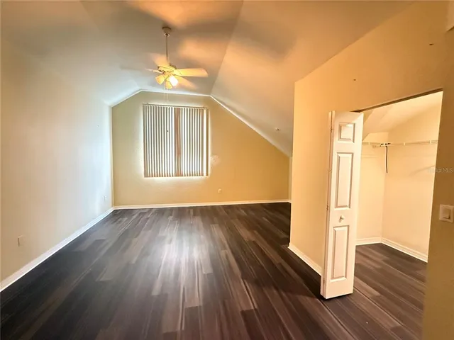 a bathroom with a double vanity sink mirror and toilet