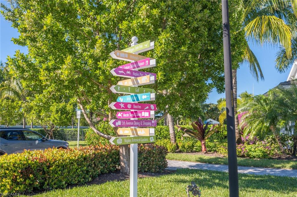 2167 Marquesa Circle Naples, FL 34112 - Photo 19 of 21 a sign that is on a tree