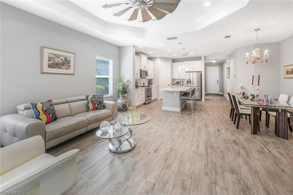 2167 Marquesa Circle Naples, FL 34112 - Photo 5 of 21 a living room with furniture and a wooden floor