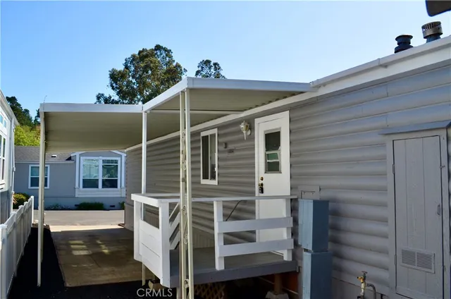 a front view of a house with a porch