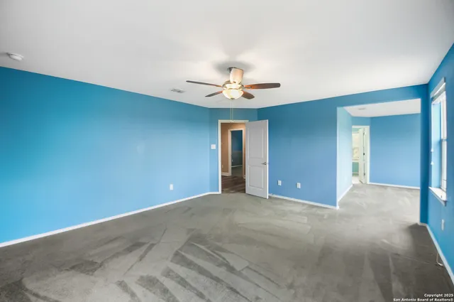 a workspace with furniture and a window