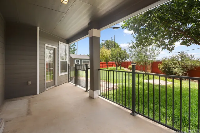 a backyard of a house with lots of green space